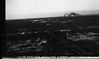 Image: negative: Oakland Airport, landing field and hangars