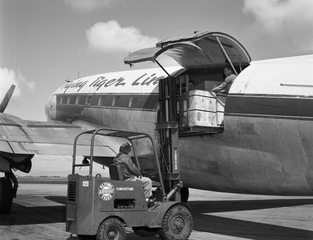 Image: negative: San Francisco Airport, Flying Tiger Line Curtiss C-46 Commando