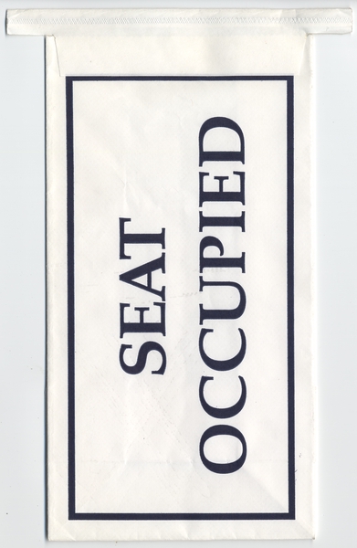 Image: airsickness bag / seat occupied: Alaska Airlines