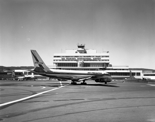 Image: negative: San Francisco International Airport (SFO), Central Terminal Building and United Air Lines Douglas DC-8-50F