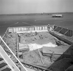 Image: negative: San Francisco International Airport (SFO), construction of Pacific Southwest Airlines (PSA) pier and jetways
