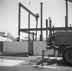 Image: negative: San Francisco International Airport (SFO), construction of Pacific Southwest Airlines (PSA) pier and jetways