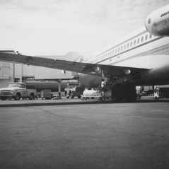 Image: photograph: San Francisco International Airport (SFO), Pacific Southwest Airlines (PSA) jetway and aircraft