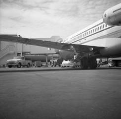 Image: negative: San Francisco International Airport (SFO), Pacific Southwest Airlines (PSA) jetway and aircraft