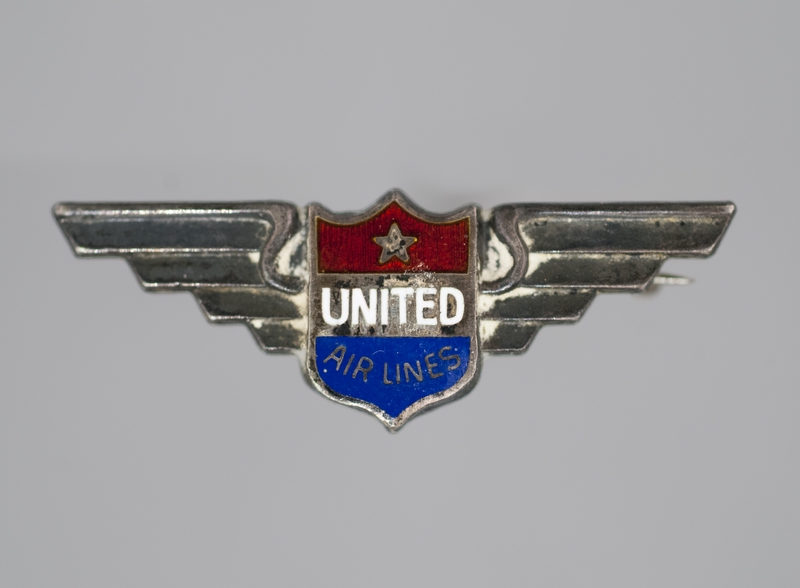 Image: service pin: United Air Lines, stewardess, 5 year