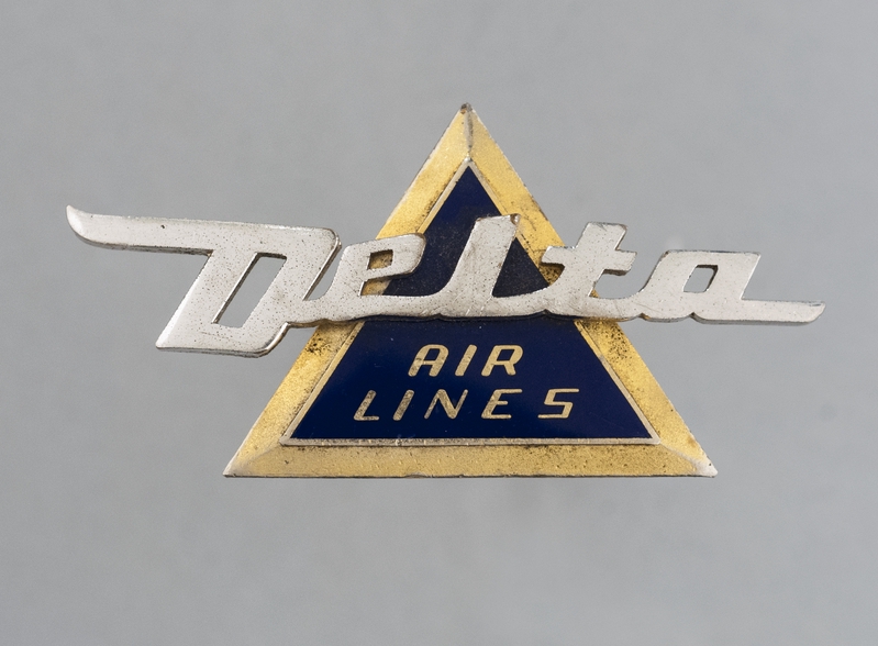 Image: stewardess hat badge: Delta Air Lines