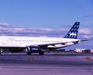 slide: JetBlue Airways, Airbus A320, John F. Kennedy International Airport (JFK)