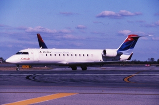 slide: Delta Air Lines Connection, Bombardier CRJ200, John F. Kennedy International Airport (JFK)