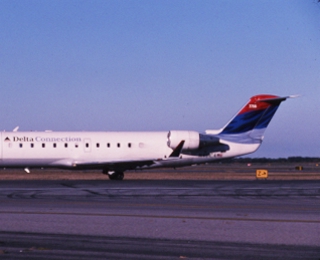 slide: Delta Air Lines Connection, Bombardier CRJ200, John F. Kennedy International Airport (JFK)