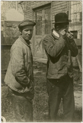 Image: photograph: San Francisco Bay Area, men with magnifying glass