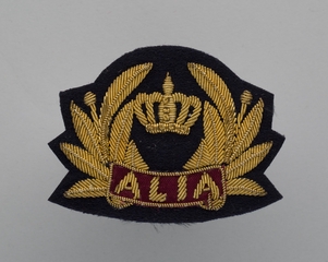 Image: flight officer cap badge: Alia (Royal Jordanian Airlines)