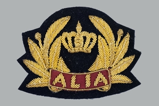 flight officer cap badge: Alia (Royal Jordanian Airlines)