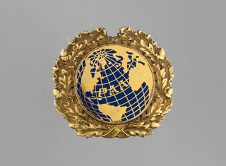 flight officer cap badge: Pan American World Airways