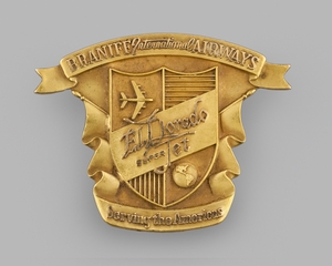 Image: air hostess hat badge: Braniff International Airways