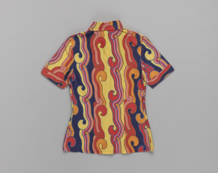 Image: flight attendant blouse: Cathay Pacific Airways