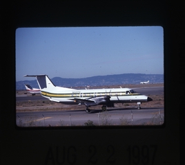 Image: slide: Mesa Airlines, Embraer EMB-120 Brasilia, San Francisco International Airport (SFO)