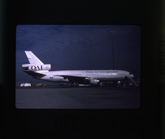 Slide: Omni Air International, McDonnell Douglas DC-10-10, San Francisco International Airport (SFO)
