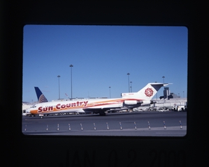 Image: slide: Sun Country Airlines, Boeing 727-200, San Francisco International Airport (SFO)
