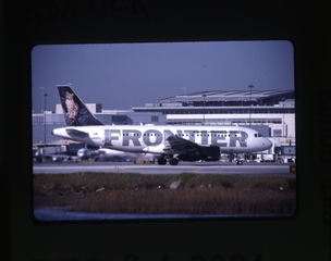 Image: slide: Frontier Airlines, Airbus A319, San Francisco International Airport (SFO)
