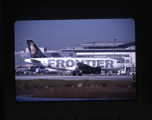 Slide: Frontier Airlines, Airbus A319, San Francisco International Airport (SFO)