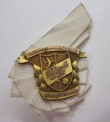 Image: hostess hat badge: Braniff International Airways
