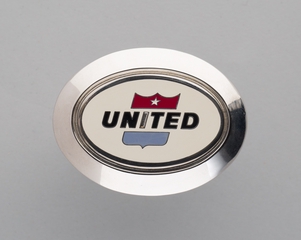 Image: gate agent hat badge: United Air Lines