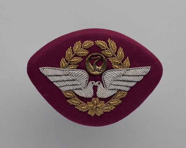 Flight officer cap badge: JAL Cargo