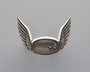 Image: flight officer cap badge: Western Airlines