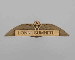 Image: flight attendant wings and name pin: America West Airlines, Lonni Sumner