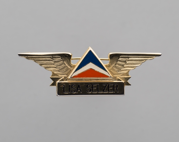 Flight attendant wings and name pin: Delta Air Lines, Lisa Selzer