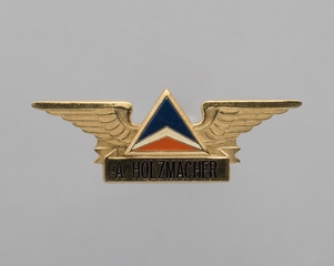 Image: flight attendant wings and name pin: Delta Air Lines, A. Holzmacher