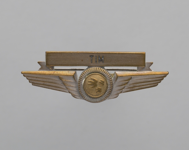 Flight attendant wings and name pin: Ozark Air Lines