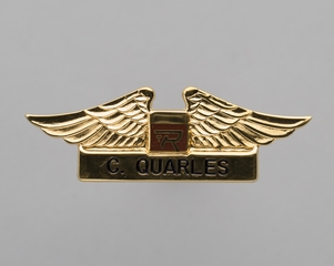 Image: flight attendant wings and name pin: Ransome Airlines, C. Quarles