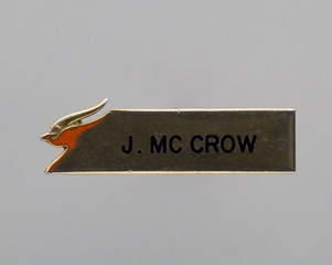 Image: name pin: Qantas Airways, J. McCrow