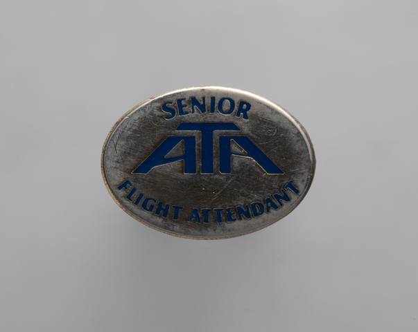 Flight attendant pin: American Trans Air (ATA), Art