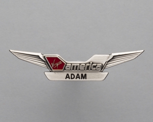 Image: flight attendant wings and name pin: Virgin America, Adam