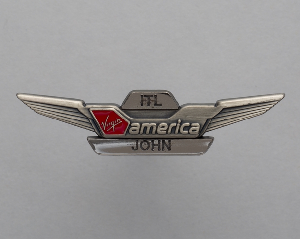 Flight attendant wings and name pin: Virgin America, John
