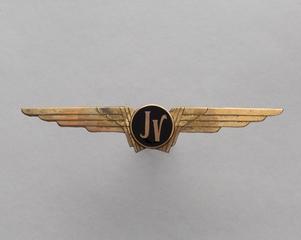 Image: flight officer wings: Jolly Voyager Travel Club