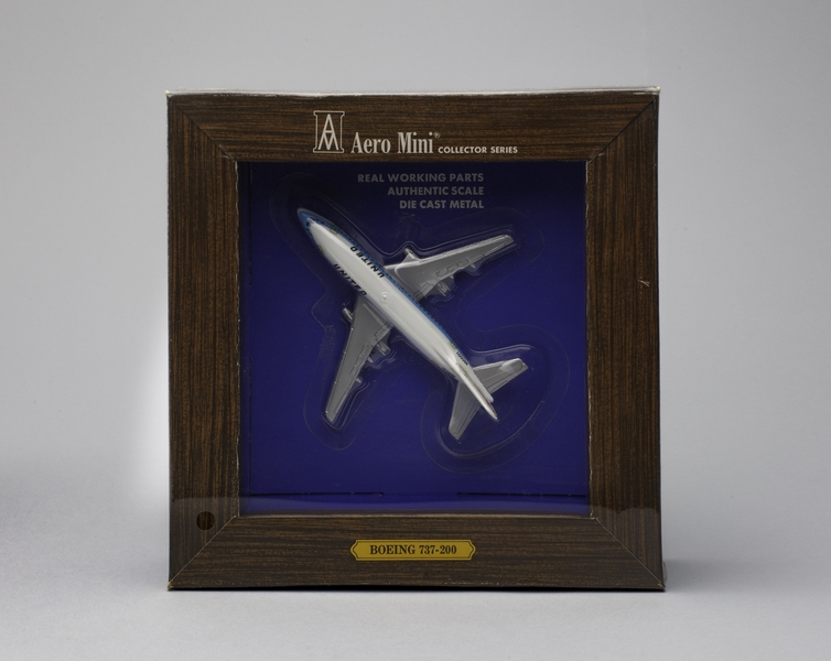 Image: miniature model airplane: United Airlines, Boeing 737-200 Commuter