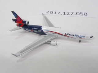 Image: miniature model airplane: Delta Air Lines, McDonnell Douglas MD-11