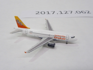 Image: miniature model airplane: Drukair, Airbus A319