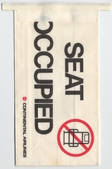 Image: airsickness bag / seat occupied: Continental Airlines