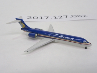 Image: miniature model airplane: Midwest Airlines, 717-200