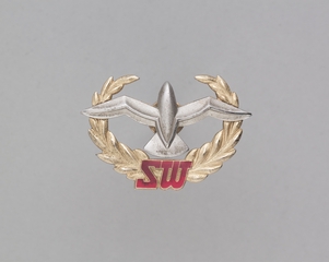 Image: flight officer cap badge: Seaboard and Western Airlines