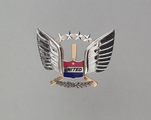 Image: flight officer cap badge: United Air Lines
