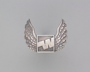 Image: flight officer cap badge: Western Airlines