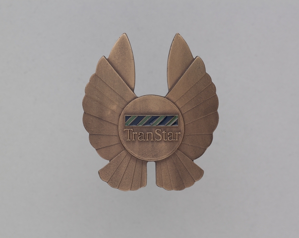Flight officer cap badge: TranStar Airlines