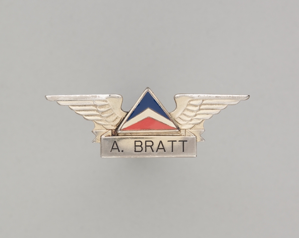 Flight attendant wings and name pin: Delta Air Lines, A. Bratt
