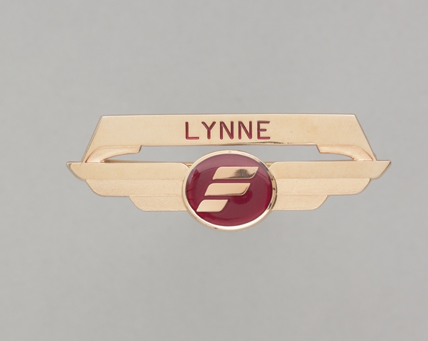 Flight attendant wings and name pin: Frontier Airlines, Lynne