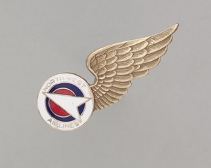 Image: stewardess hat badge: Northwest Airlines
